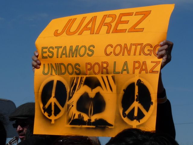 This poster, at a bi-national rally for peace in Juarez on the border, shows the linked nature of the two cities.