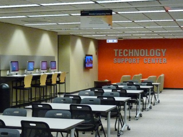 Workstations and meeting tables in Technology Support Center