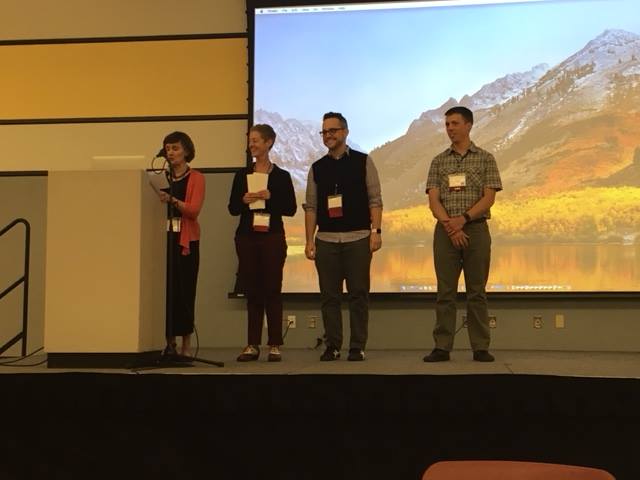 Image of Tim Lockridge and Derek Van Ittersum receiving the DRC Book Prize at the 2018 Computers and Writing conference.