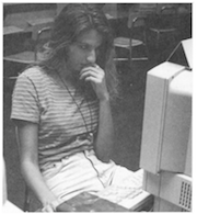 High school student working on an essay on a computer