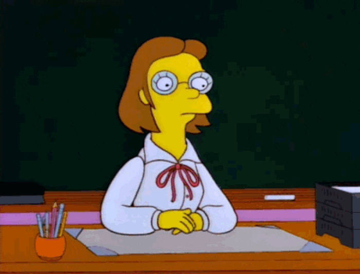 Simpsons teacher reaches under desk and presses red 'independent thought alarm' button.