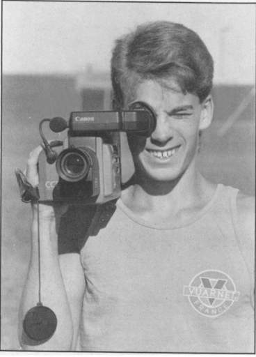Image of student with videocassette camera