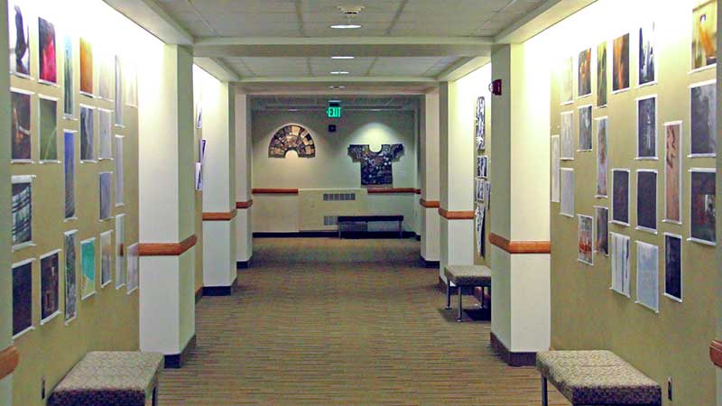 hallway with art on display